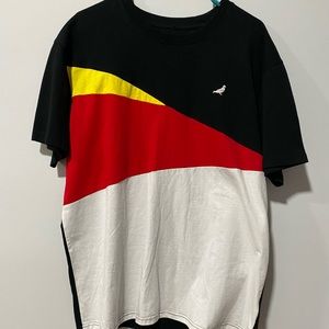 Staples Pigeon Tee.